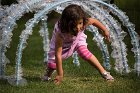 Many youngsters enjoyed climbing through "Tunnel Vision" made of plastic hula hoops, cellophane and wood stakes.  This installation by Maria Ritz represented long ago ice that formed on Spy Pond.